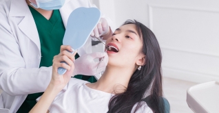 Voucher giảm giá trị giá 5 triệu áp dụng cho dịch vụ niềng răng implant tại Smile Beauty